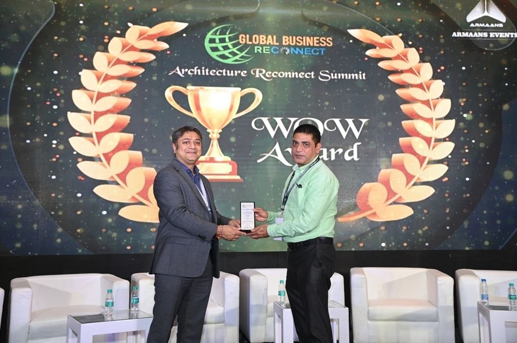 Wizspace Interior receiving WOW Award at Architecture Reconnect Summit